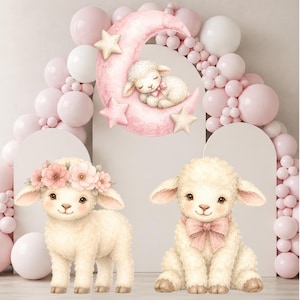 May include: A wall decal set featuring a watercolour illustration of a sleeping lamb on a pink crescent moon with stars, a standing lamb wearing a pink floral crown, and a sitting lamb with a pink bow, surrounded by an arch of pink and white balloons.