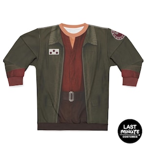 May include: A long-sleeved sweatshirt featuring a costume design. The design includes a dark green jacket, a red shirt, and brown pants, with a belt detail. The cuffs and collar are a contrasting color. The sweatshirt has a logo in the bottom right corner.