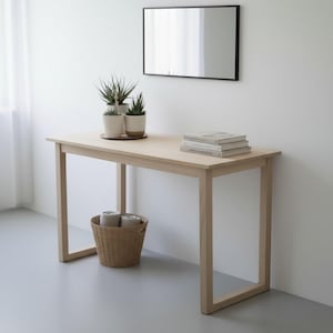 Consola de madera de olmo claro, ideal para recibidor, escritorio o mesa auxiliar.