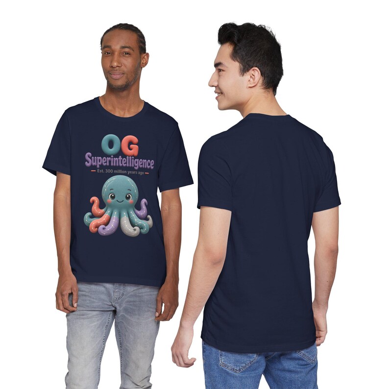 May include: A navy blue short-sleeve t-shirt featuring a graphic of a multi-colored octopus with the text "OG Superintelligence" and "Est. 300 million years ago" printed above the creature in a playful, rounded font style.