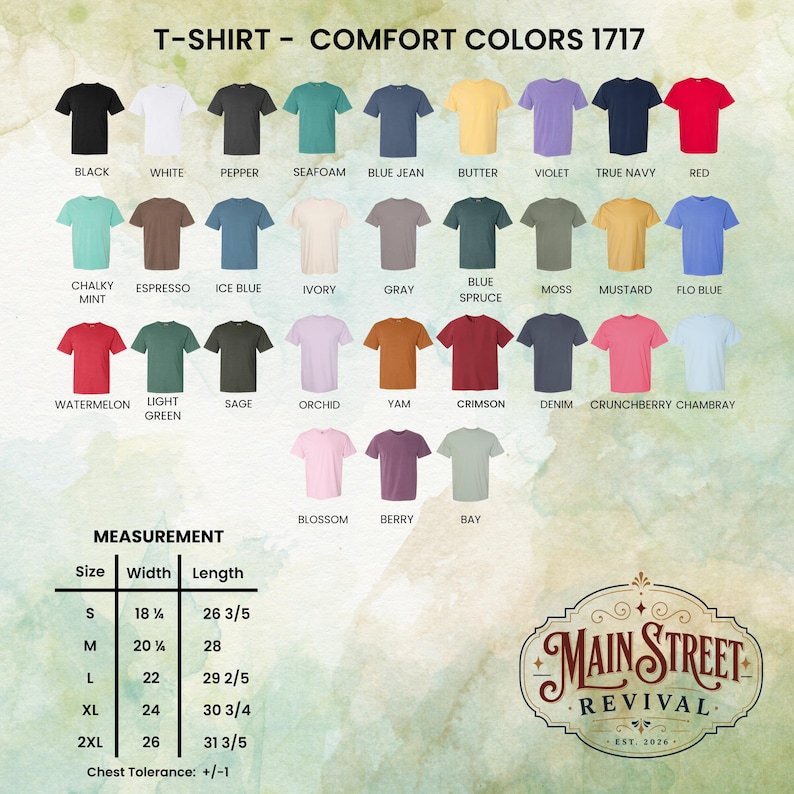 Peut inclure: Pr&eacute;sentation de t-shirts Comfort Colors 1717 dans diverses couleurs, dont noir, blanc et rouge. L'image comprend un tableau des tailles avec des mesures en cm et le logo Main Street Revival.