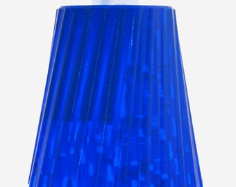 May include: A vibrant blue pendant lamp with a pleated, cone-shaped shade. The lamp has a white top and a cord for hanging. The shade's design creates a textured appearance, adding a modern touch to the lighting fixture.