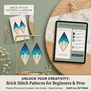 May include: A pair of diamond-shaped beaded earrings featuring a gradient of dark blue, royal blue, and turquoise transitioning to white with gold accents. The earrings hang from a gold stand next to a digital tablet displaying a bead pattern chart.