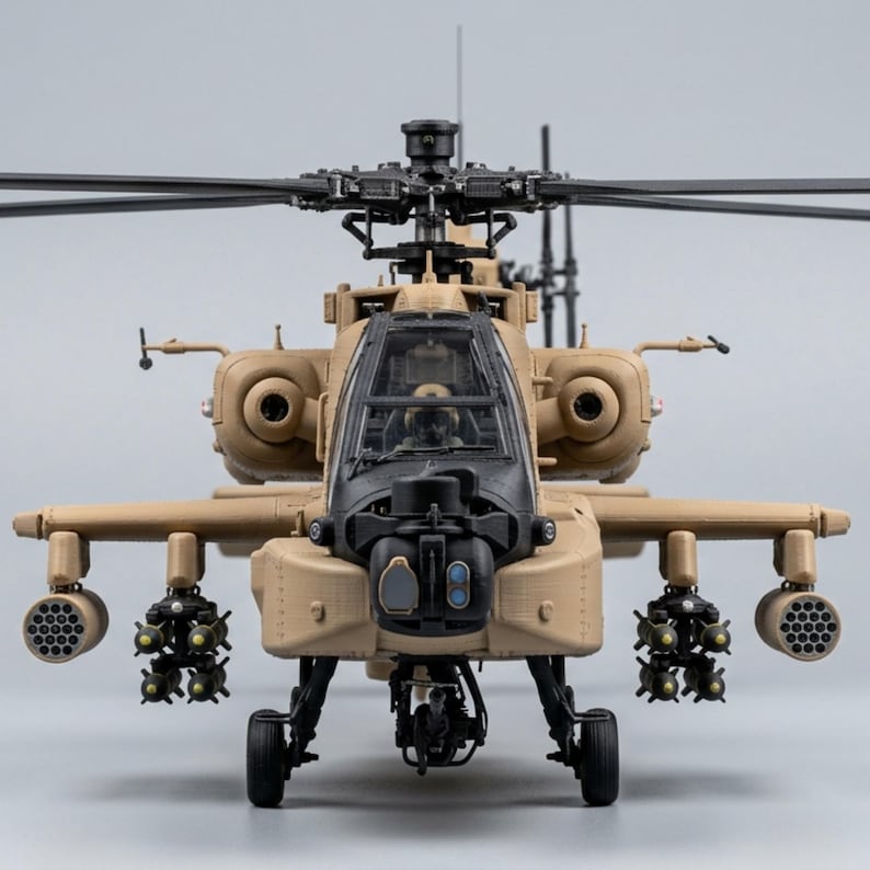 May include: Tan and black model helicopter with detailed features, including a cockpit, rotor blades, and missile launchers. The helicopter is a military-style aircraft, showcasing a realistic design.