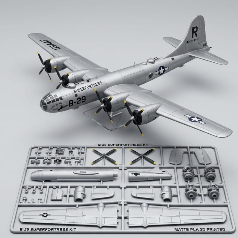May include: A silver B-29 Superfortress model airplane with four propellers and the text "SUPERFORTRESS" and "B-29". The model kit includes various unassembled parts. The text "B-29 SUPERFORTRESS KIT" is visible.