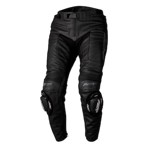 May include: Black motorcycle pants with reinforced knee pads and the "RST" logo. The pants have a zippered fly, belt loops, and a tailored fit. The design includes ribbed panels above the knees and a zipper at the ankles.