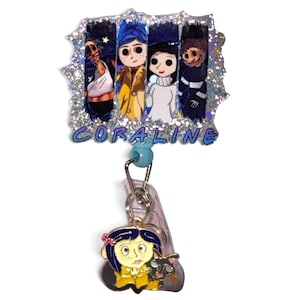 May include: A badge reel featuring a rectangular glittery topper with four character illustrations and the text CORALINE in blue letters. A small metal charm of a character with blue hair and a black cat hangs from the retractable cord below.