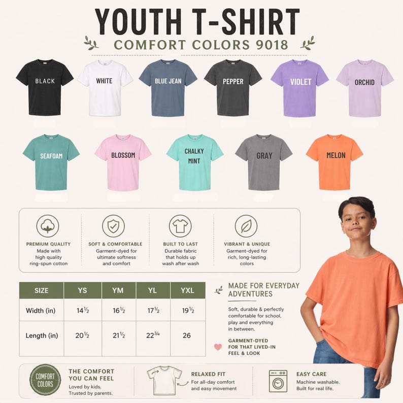 May include: A display of youth t-shirts in various colors, including black, white, blue jean, pepper, violet, and orchid. The image also shows the t-shirt's size chart, with widths ranging from 14.5 to 19.5 inches and lengths from 20.5 to 26 inches.