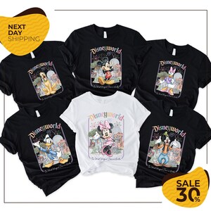 The image is a collection of Disney World merchandise, including t-shirts and shirts featuring various Disney characters such as Mickey Mouse, Minnie Mouse, Donald Duck, and Goofy. The items are displayed in a way that showcases the Disney World theme and the characters featured in the merchandise.