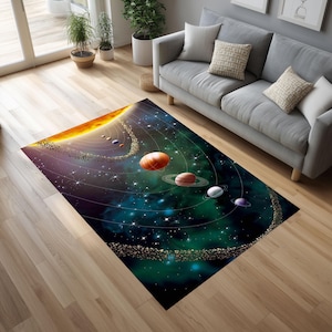 May include: A rectangular area rug featuring a vibrant depiction of the solar system. The design includes a bright sun, planets, asteroid belts, and a starry background in shades of orange, blue, and green. The rug is placed on a wooden floor.