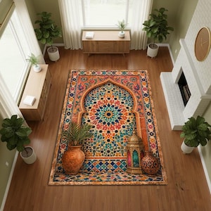 May include: A rectangular area rug featuring a vibrant, intricate mosaic pattern with an arched doorway design. The rug displays a central geometric star motif in shades of orange, teal, and blue, accented by a decorative lantern and two terracotta pots.
