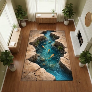 Op de afbeelding: Een rechthoekig vloerkleed met een 3D rivierlandschap. Het kleed toont een blauwe rivier met koi karpers, omlijst door rotsachtige kliffen. Het ontwerp creëert een illusie van diepte en natuurlijke schoonheid. Geschikt voor een woonkamer.