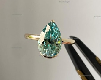 Päronformad förlovningsring med blågrön ädelsten, minimalistisk halv bezelring i massivt guld, blågrön moissanit droppring, löftering för henne