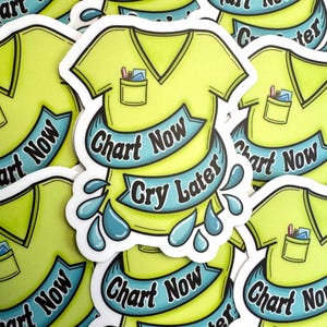May include: A collection of stickers featuring a yellow scrub top design with a pocket containing pens and papers. The stickers have a blue banner that reads "Chart Now Cry Later". The design includes blue teardrops.
