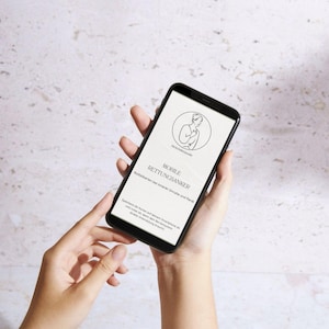 May include: A black smartphone displaying a white screen with a circular line-art illustration of a person, the text MOBILE RETTUNGSANKER, and additional German text regarding emergency cards for use during times of distress and panic.