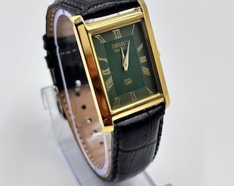 Klasyczny męski zegarek na rękę Seiko z zieloną tarczą i mechanizmem kwarcowym