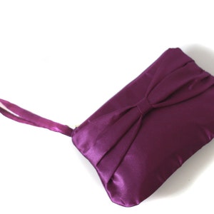 Bridesmaid clutch purple satin with bow and hidden strap