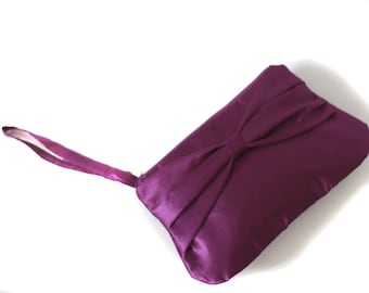 Bridesmaid clutch purple satin with bow and hidden strap