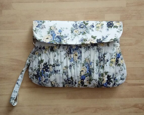 blue floral clutch bag