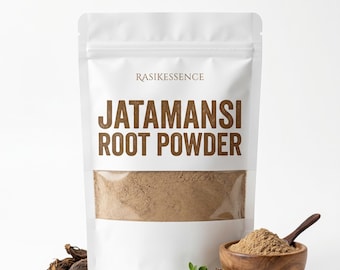 May include: A white stand-up pouch labeled RASIKESSENCE JATAMANSI ROOT POWDER containing light brown powder. A wooden bowl filled with the same powder and a small wooden spoon sits nearby, accompanied by dark brown roots and small green leaves.