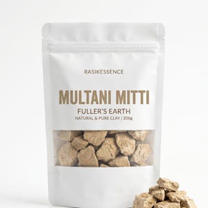 May include: A white pouch of Multani Mitti, also known as Fuller's Earth, with a clear window showing the clay inside. The text "RASIKESSENCE" and "NATURAL & PURE CLAY | 200g" are printed on the front. A small pile of clay is at the bottom.