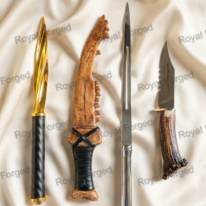 May include: Four distinct knives arranged vertically. The first has a gold spiral blade and black handle. The second is a curved, textured brown bone-like knife with a black grip. The third is a long, slender silver letter opener. The fourth has a serrated blade and a dark brown antler handle.