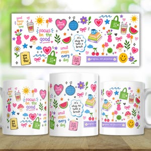 May include: A white ceramic mug featuring a colorful pattern of small illustrations including hearts, flowers, mushrooms, smiley faces, disco balls, books, and tote bags, along with text phrases like focus on the good and it's okay to take a break.