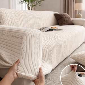 May include: A set of three ceramic mugs with a speckled, matte finish. The mugs are in shades of cream, light gray, and dark gray. Each mug has a simple, minimalist design, perfect for coffee or tea.