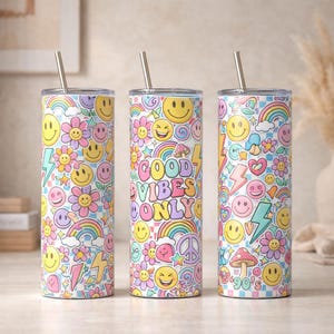 May include: A set of three ceramic mugs with a speckled, matte finish. The mugs are in shades of cream, light gray, and dark gray. Each mug has a simple, minimalist design and a rounded handle. The mugs are suitable for coffee or tea.