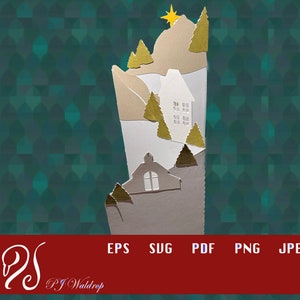 Puede incluir: Un diseño de papel de una escena de pueblo de invierno con una casa blanca, árboles y una estrella en la cima de una colina. El diseño está recortado en papel blanco, marrón y dorado.