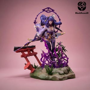 May include: A detailed figurine of a character with purple hair and attire, standing on a rocky base with a red torii gate. The figure is surrounded by purple energy effects. The background is a solid pink color, and the logo "BlackRosesID" is visible.
