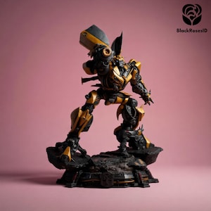 May include: A detailed figurine of a robot character in a dynamic pose. The figure is predominantly yellow and black, with intricate mechanical detailing. It stands on a rocky base with a Transformers logo, set against a pink background.
