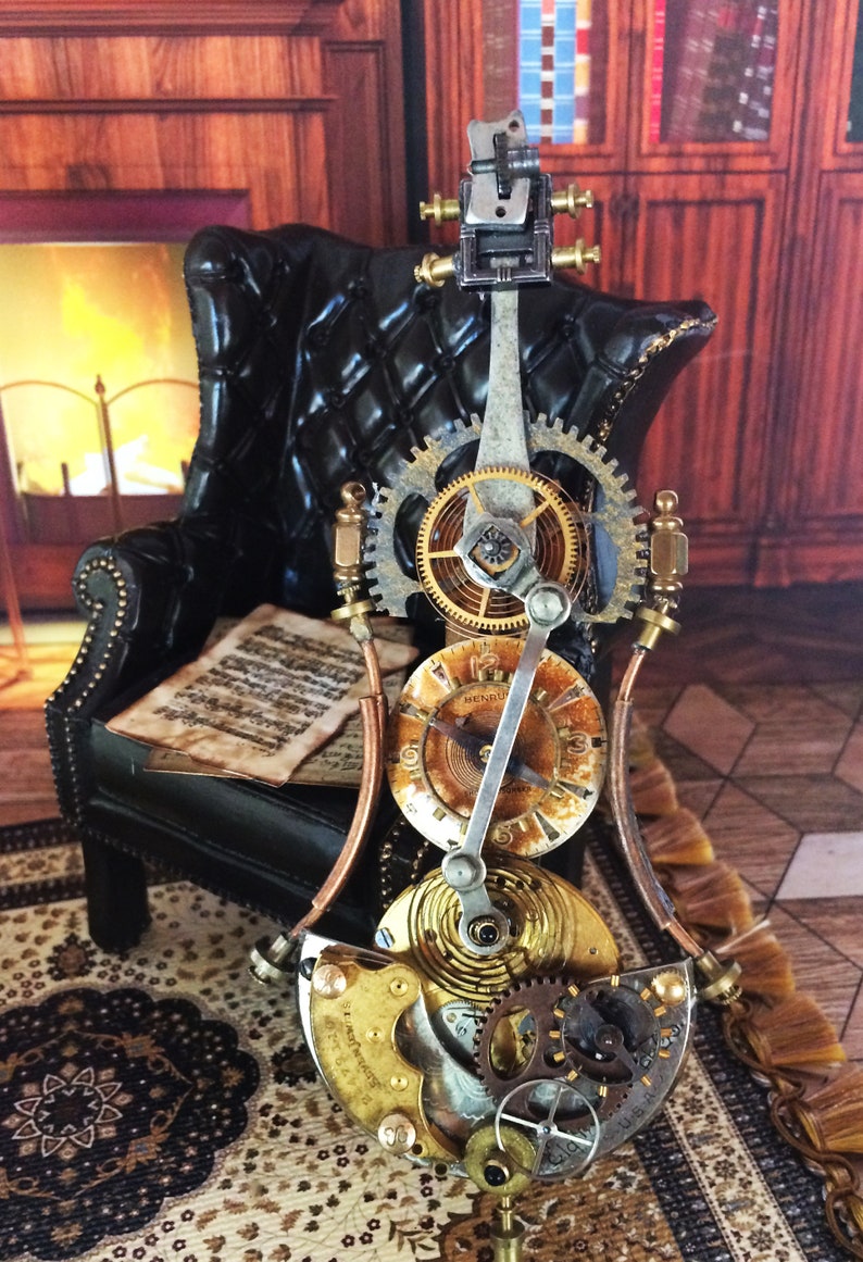 May include: A steampunk-style, clockwork sculpture of a double bass with intricate gears and clock faces. The sculpture is made of metal and has a copper-colored finish. It is sitting on a patterned rug in front of a black leather armchair.