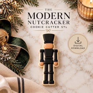 May include: A nutcracker-shaped cookie cutter with a black and cream color scheme. The text THE MODERN NUTCRACKER COOKIE CUTTER STL is printed above the cutter, and a circular icon with a downward arrow and the text DIGITAL DOWNLOAD is visible.
