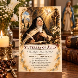 May include: A rectangular religious prayer card featuring an illustration of St. Teresa of Avila, text reading St. Teresa of Avila, Doctor of the Church, and the poem Nothing Disturb You, with a dove, a crucifix, and a skull depicted in the artwork.