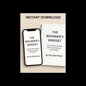 May include: A smartphone and a book are shown, both with the title "The Beginner's Mindset." The book and phone also include the text "A short guide to starting, learning, and growing with intention" and "By Sifu Rob Wood."