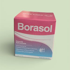 Może przedstawiać: Różowe i białe pudełko Borasol, odświeżającej formuły. Pudełko zawiera tekst w języku hiszpańskim, w tym "Anti-bacterial" i "4 Oz (114 g)". Pudełko ma symbol zrównoważonego pH i jest proszkiem antyseptycznym.