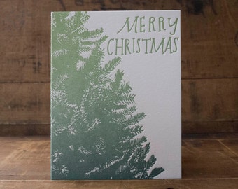 Tarjeta tipográfica con diseño de árbol de Navidad