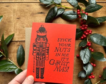 ¡Méteme las nueces! ¡Es Navidad! Divertida tarjeta navideña impresa.