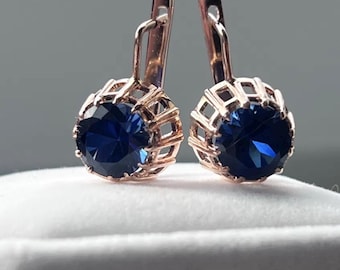 Stunning vintage 583 gold earrings with deep blue sapphire stones. Elegant Soviet-era design, timeless and eye-catching.
