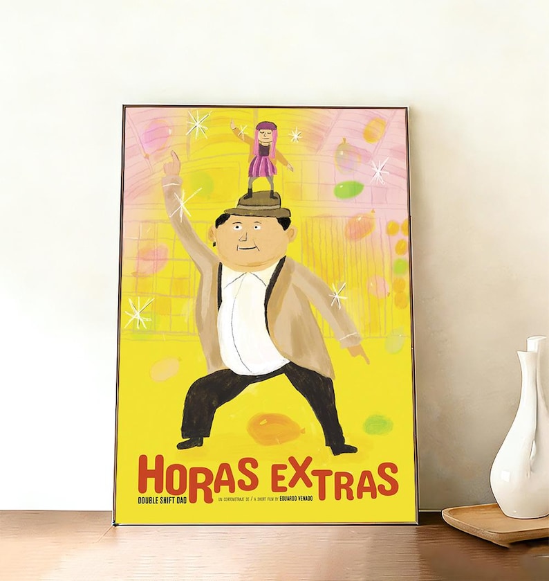 May include: A framed poster with a yellow background features a cartoon illustration. The artwork depicts a man with a small figure on his head, with the words "HORAS EXTRAS" in red. The poster is displayed on a wall.
