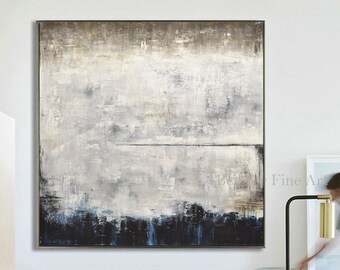 May include: Abstract painting with shades of gray, white, and blue. The painting is framed and hanging on a white wall.