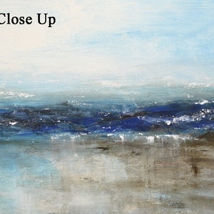 May include: Abstract painting of a seascape with blue, white, and brown colors. The painting depicts a horizon with a blue sky and a blue ocean with white waves. The bottom of the painting shows a brown beach.