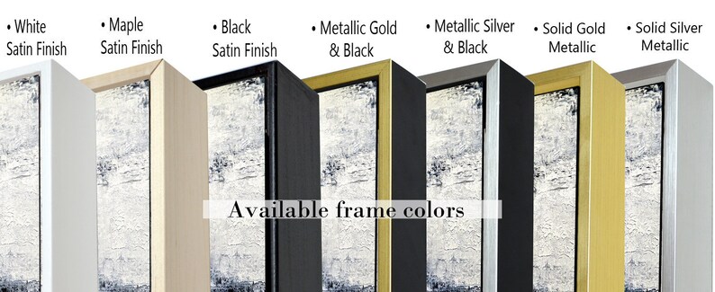 May include: A close-up of eight different frame colors for artwork. The colors are white, maple, black, metallic gold and black, metallic silver and black, solid gold metallic, and solid silver metallic. The text "Available frame colors" is displayed below the frames.
