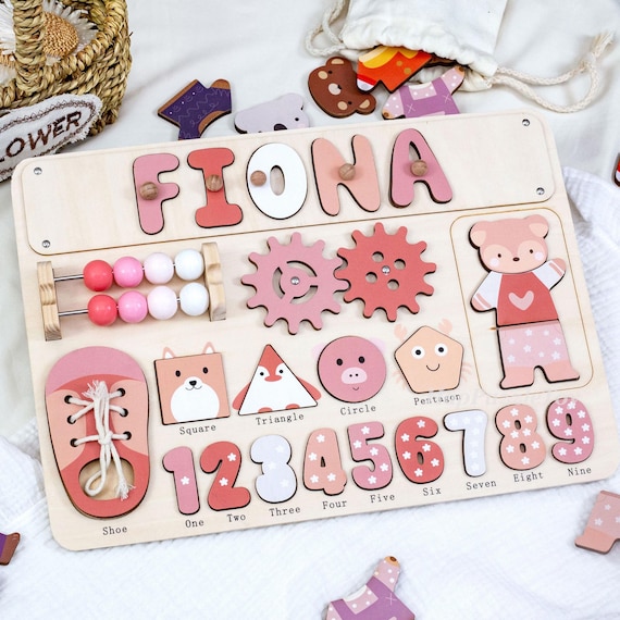 A Montessori-style wooden name puzzle that's also a personalized keepsake — 30 favorites show real parent demand for this over generic plastic toys.