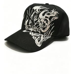 May include: Black baseball cap with a curved brim. The cap features a white embroidered design of a skull and flames, along with the letters "NY". The cap is made of a durable fabric and has a structured fit.