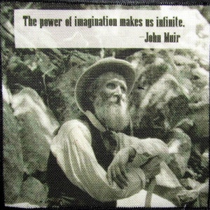 May include: Black and white image of a man with a beard and a quote about the power of imagination. The quote reads "The power of imagination makes us infinite. - John Muir".