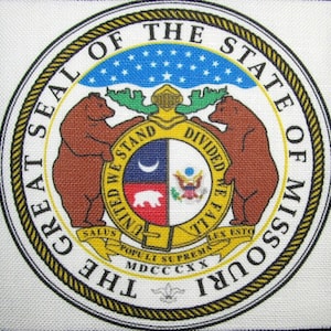May include: The Great Seal of the State of Missouri features two brown bears standing on either side of a shield with a blue crescent moon, a white star, and a red and white bear. The shield is surrounded by a yellow ribbon with the words "United We Stand, Divided We Fall" and "Salus Populi Suprema Lex Esto" in Latin. The seal is surrounded by a black and gold rope design with the words "The Great Seal of the State of Missouri" in a circle.