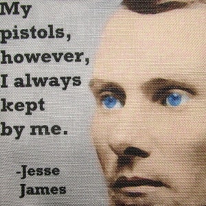 May include: A black and white image of a man with blue eyes. The quote "My pistols, however, I always kept by me. -Jesse James" is printed on a grey background.
