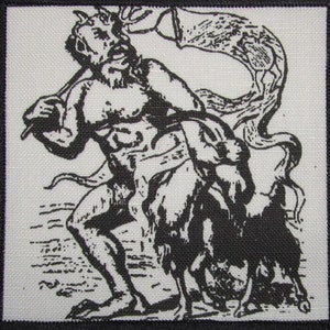 May include: Black and white embroidered patch featuring a horned figure holding a banner. The figure is depicted in a dynamic pose, with a muscular build and a fierce expression. The banner is flowing behind the figure, creating a sense of movement. The patch is suitable for jackets, bags, or other fabric items.